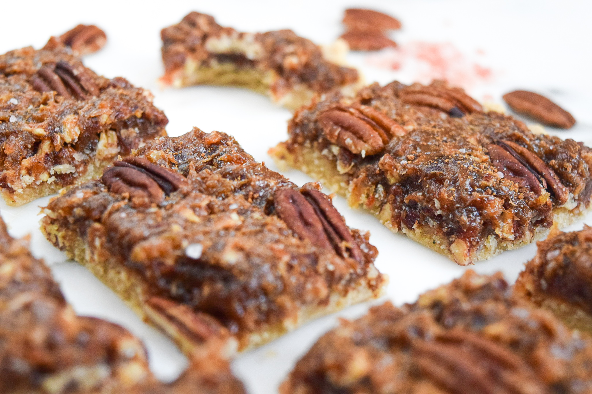 Pecan Pie bars showcasing gooey center