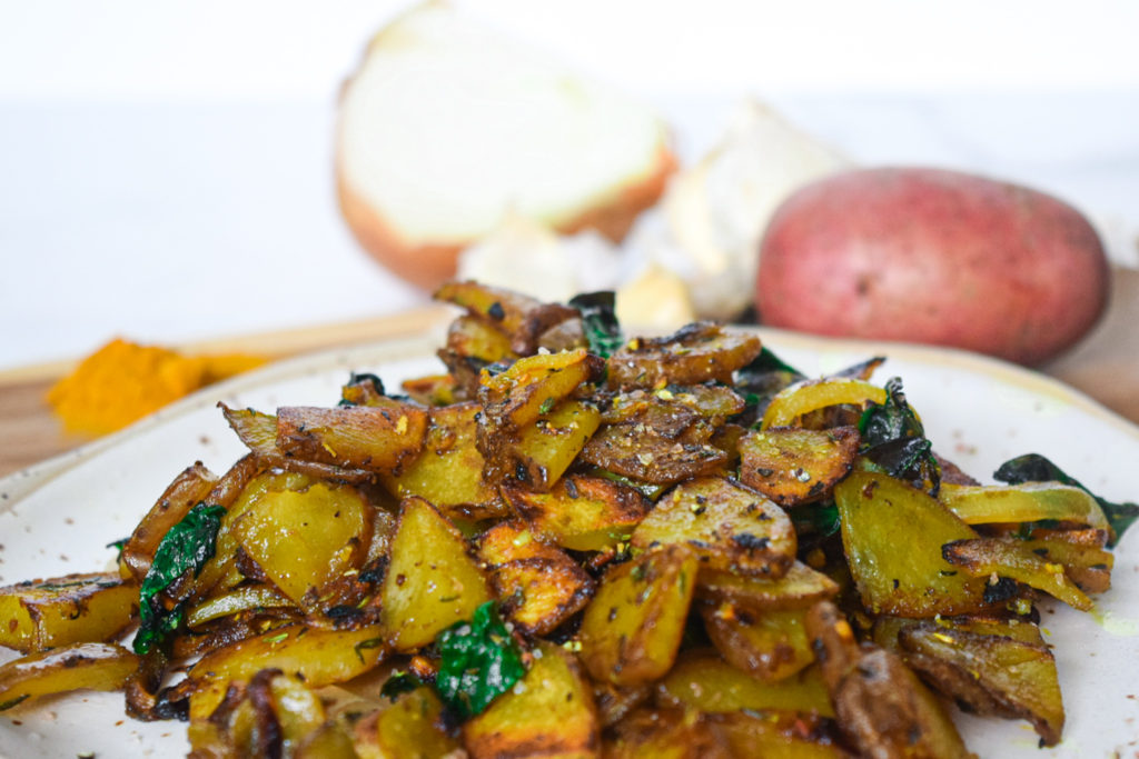 Showing the crispyness of these crispy golden breakfast potatoes